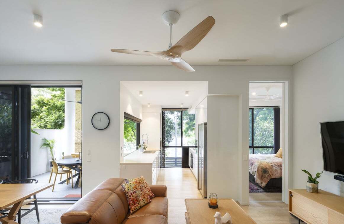 Ceiling Fan with wood finish Installed in a Modern Living Room
